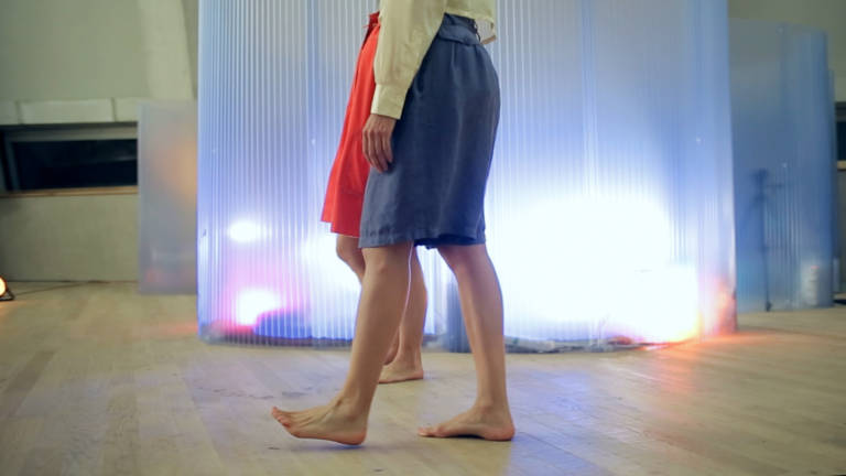 Jan leading participant on a blindfolded walk, part of the immersive participatory experience within Movement Alphabet to explore personal memories of movement. Taken while exhibited at Tate Modern